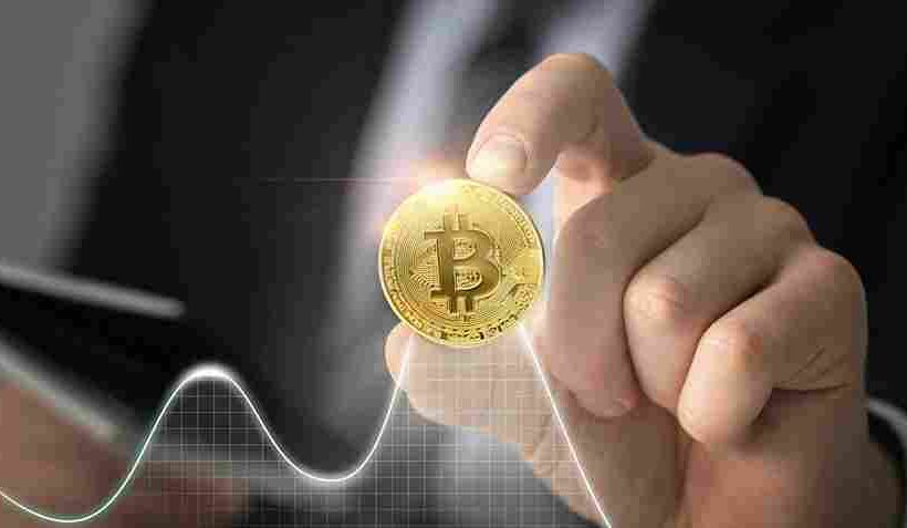 close-up-hand-holding-coin (1)-min (1) (1)_11zon