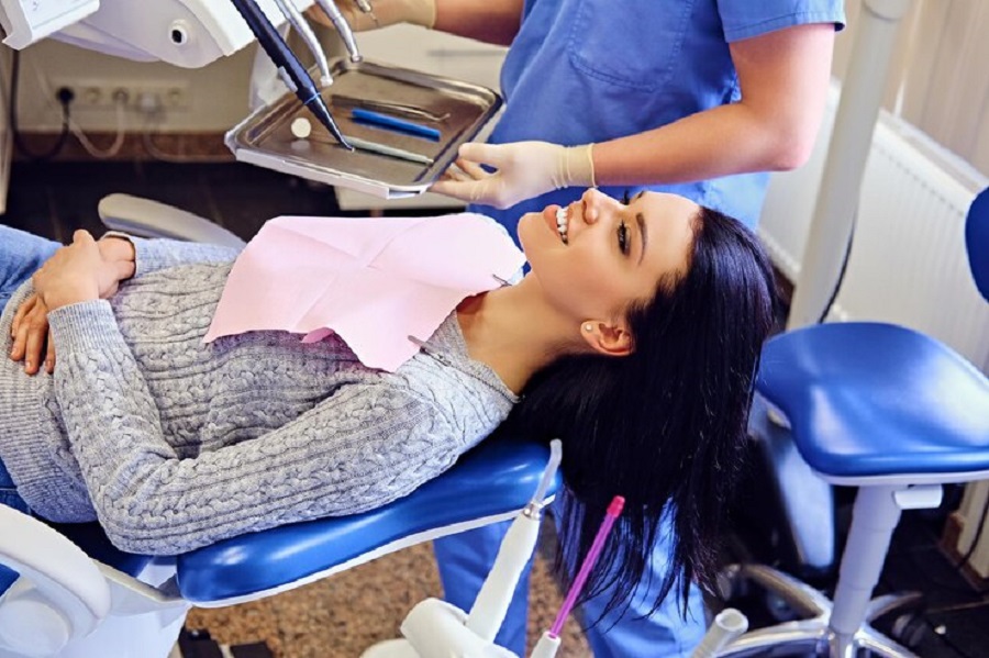 close-up-image-dentist-examining-female-s-teeth-dentistry_613910-11476