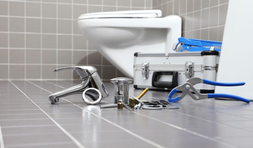 plumber-tools-and-equipment-in-a-bathroom--plumbing-repair-service--assemble-and-install-concept-914972980-0fe9cab0e1a04a3089235dc3666a7ec3