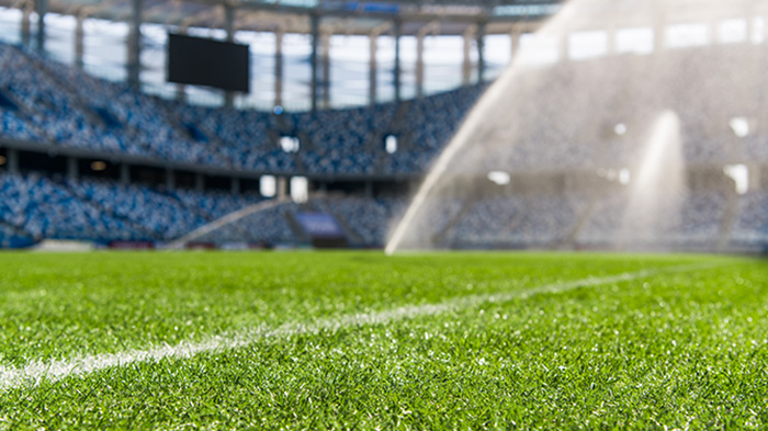 stadium-synthetic-lawn-sprinklers-running